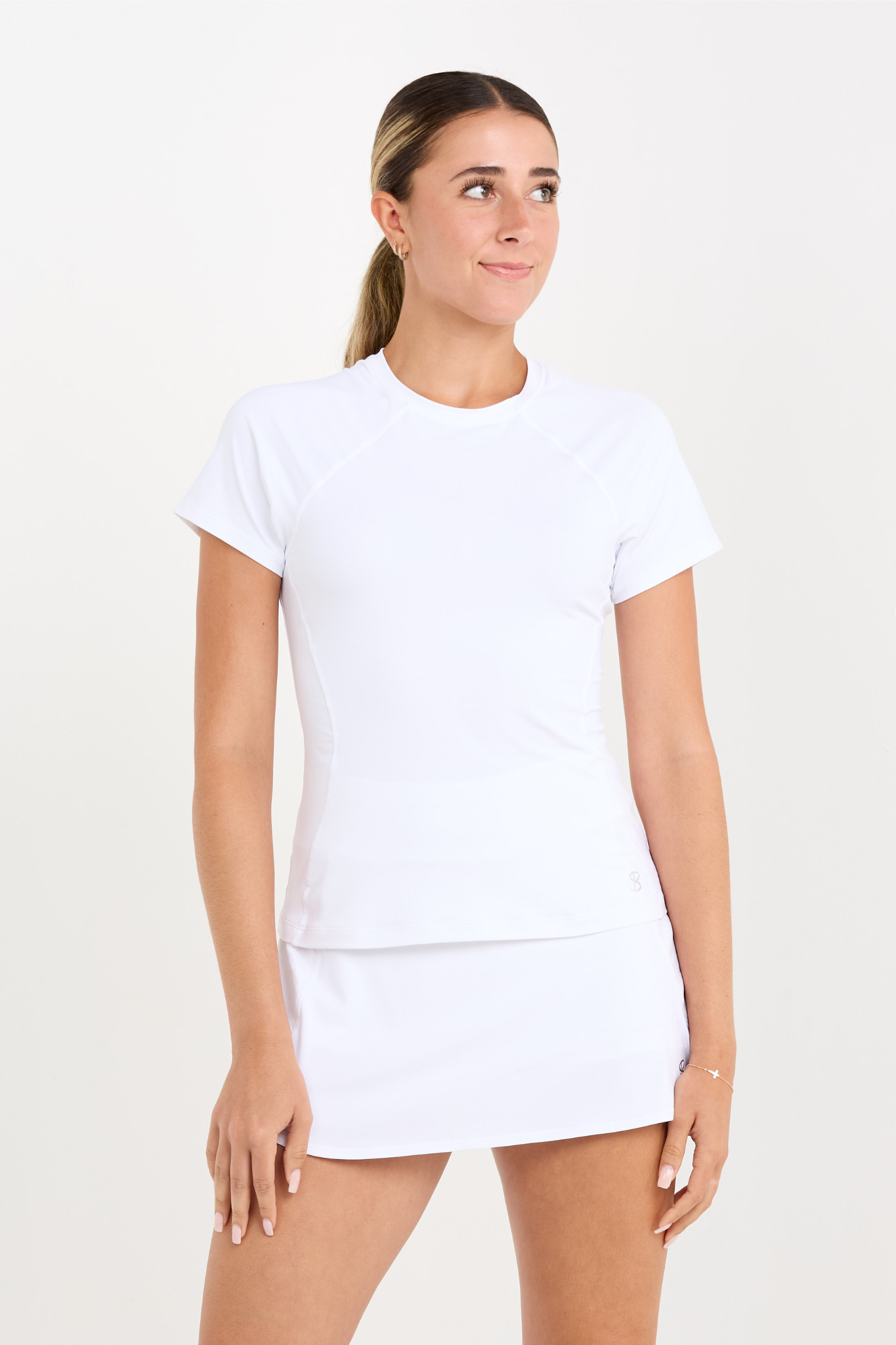 Women's Equilibrium Tennis Short Sleeve Top by Sofibella, front view on model