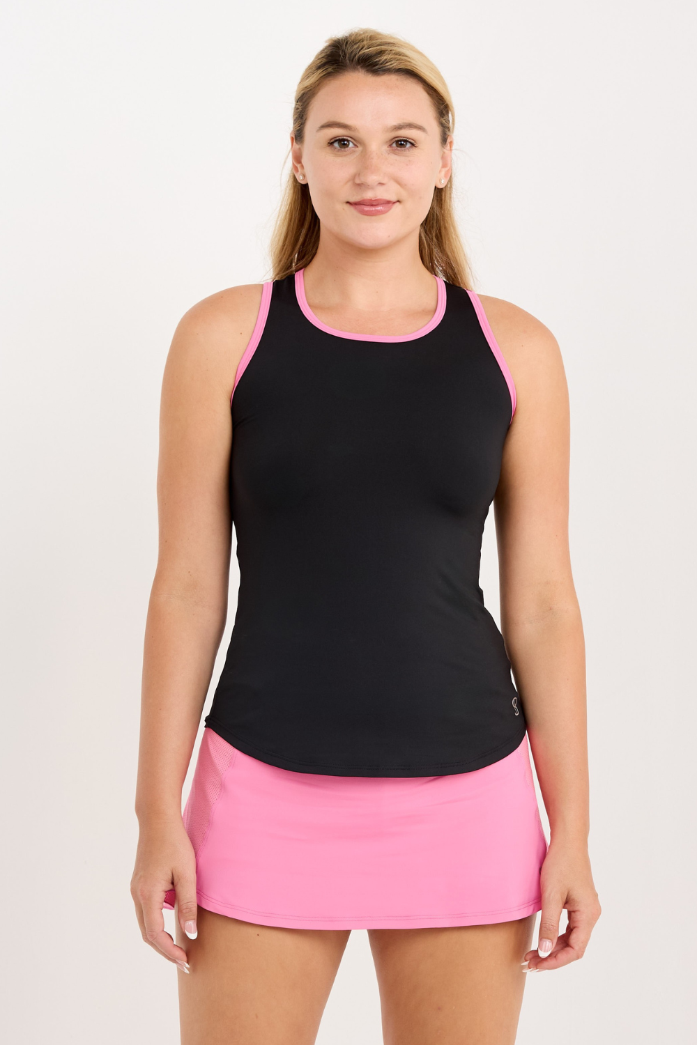 Sofibella Women's Black Racerback Tennis Tank Top with Pink Trim, close up front view on model