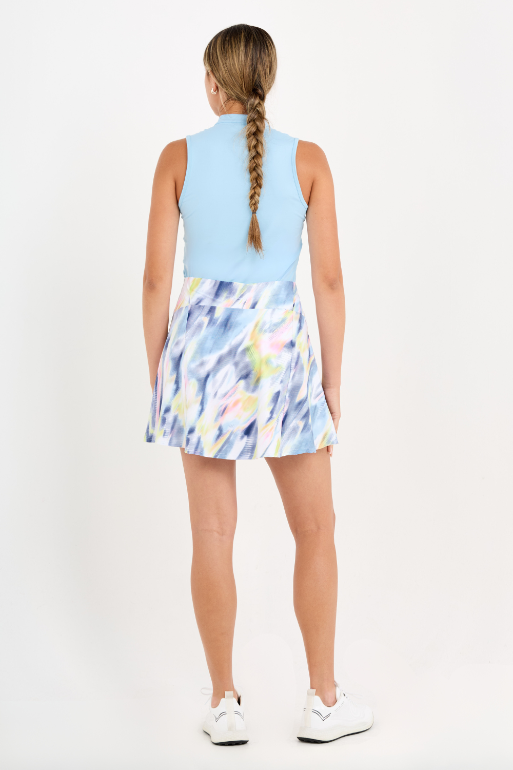 16" Aurora Sky Print Golf Skort by Sofibella, back view on model