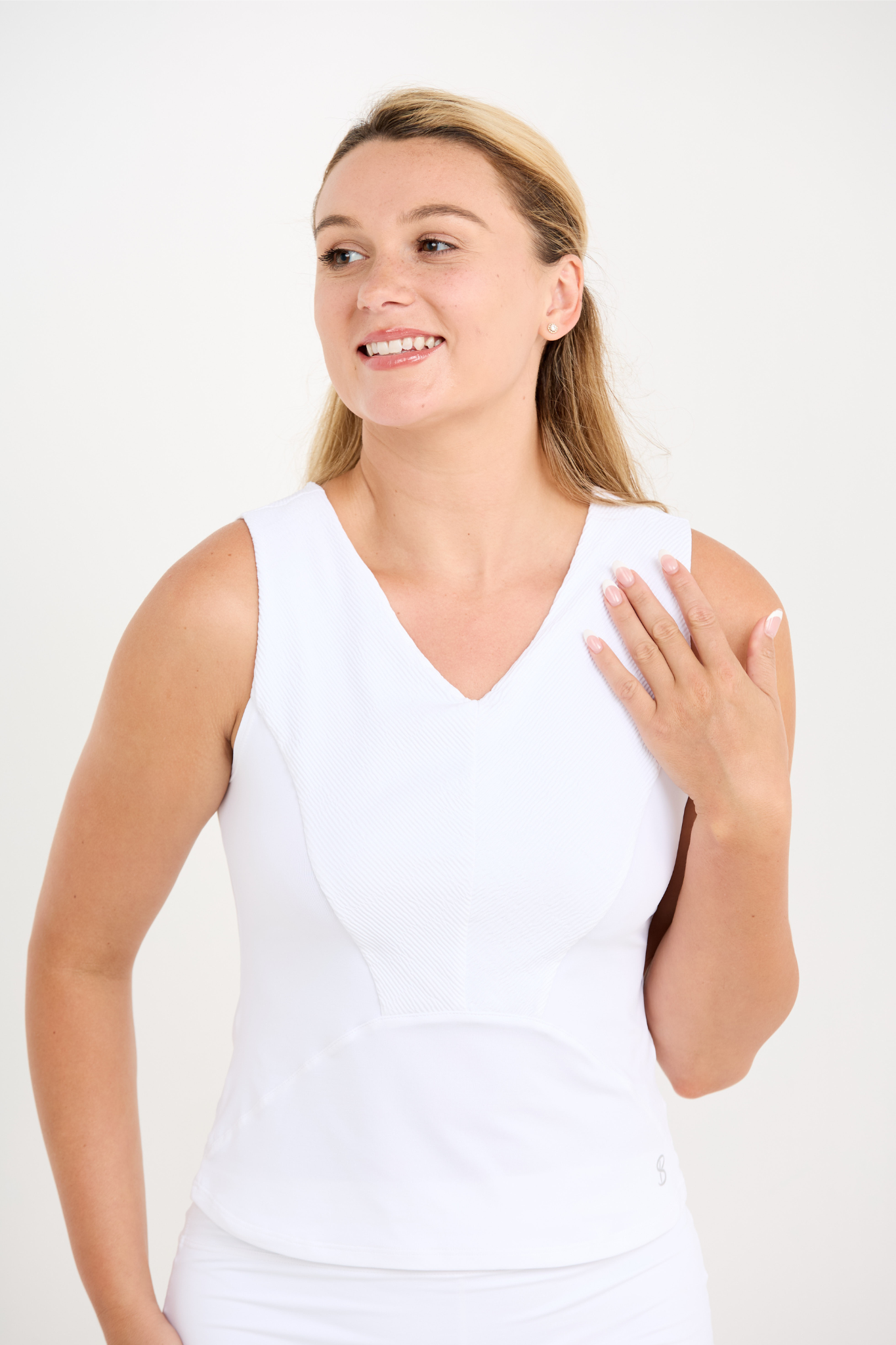 Women's Equilibrium White V Neck Tennis Tank Top by Sofibella, close up front view on model