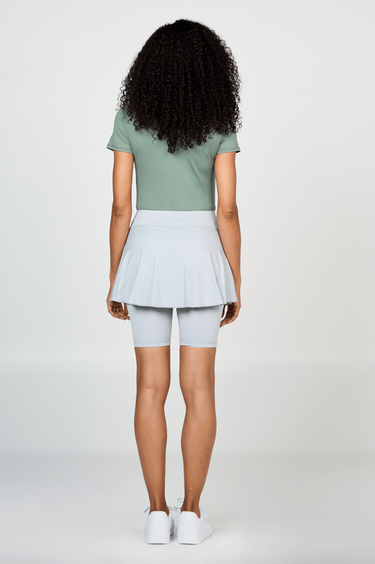 Women's Jan Bermuda Grey Tennis Skort with Built-In Biker Shorts and Ball Pocket by Sofibella, back view