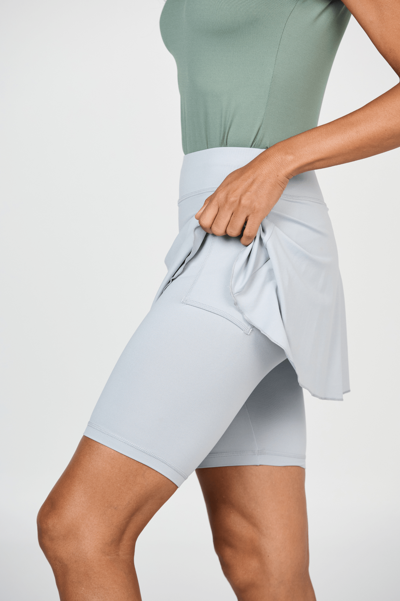 Women's Jan Bermuda Grey Tennis Skort with Built-In Biker Shorts and Ball Pocket by Sofibella, side view