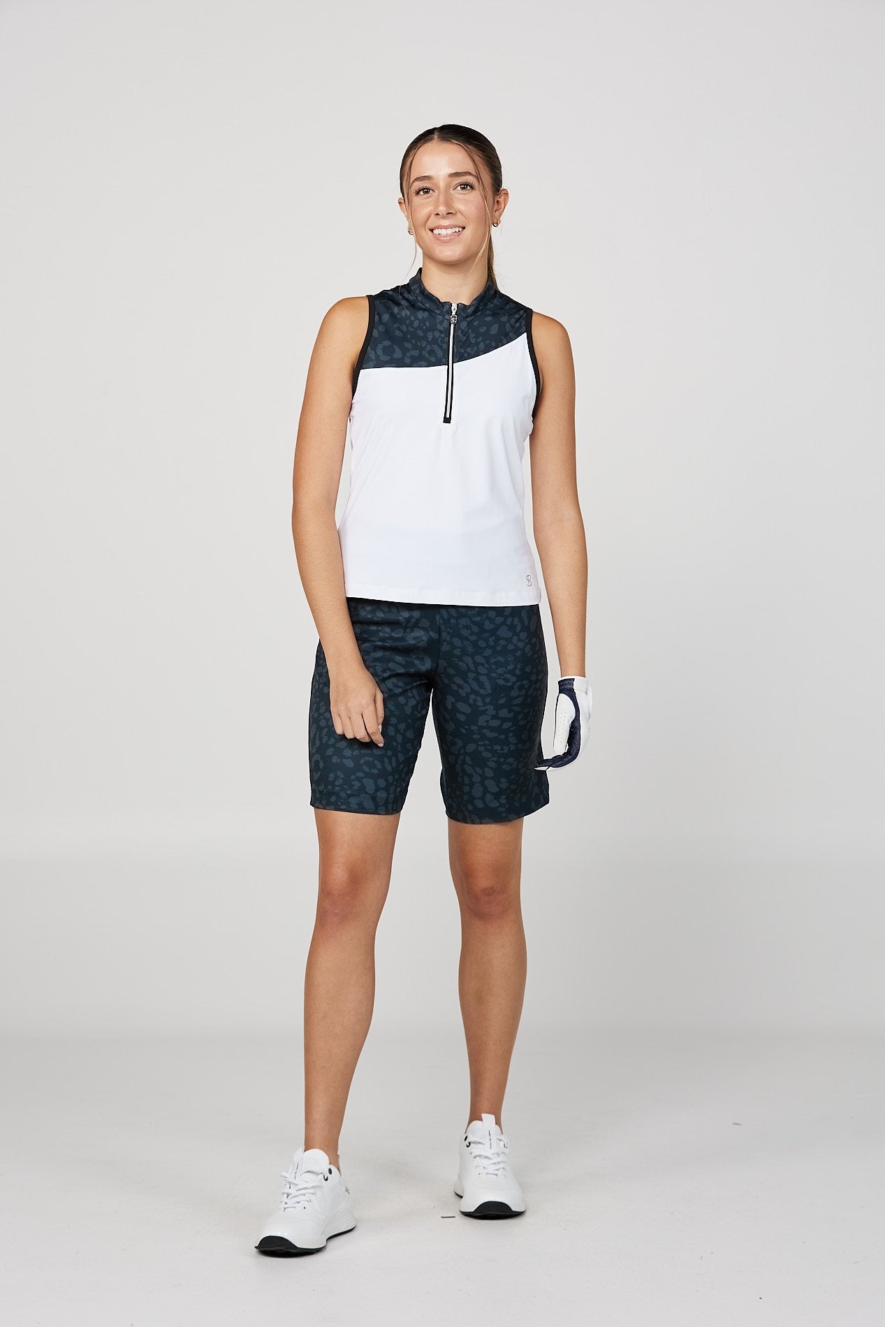 Isla Bonita Women's Golf Sleeveless Zipper Top by Sofibella, white and navy front view