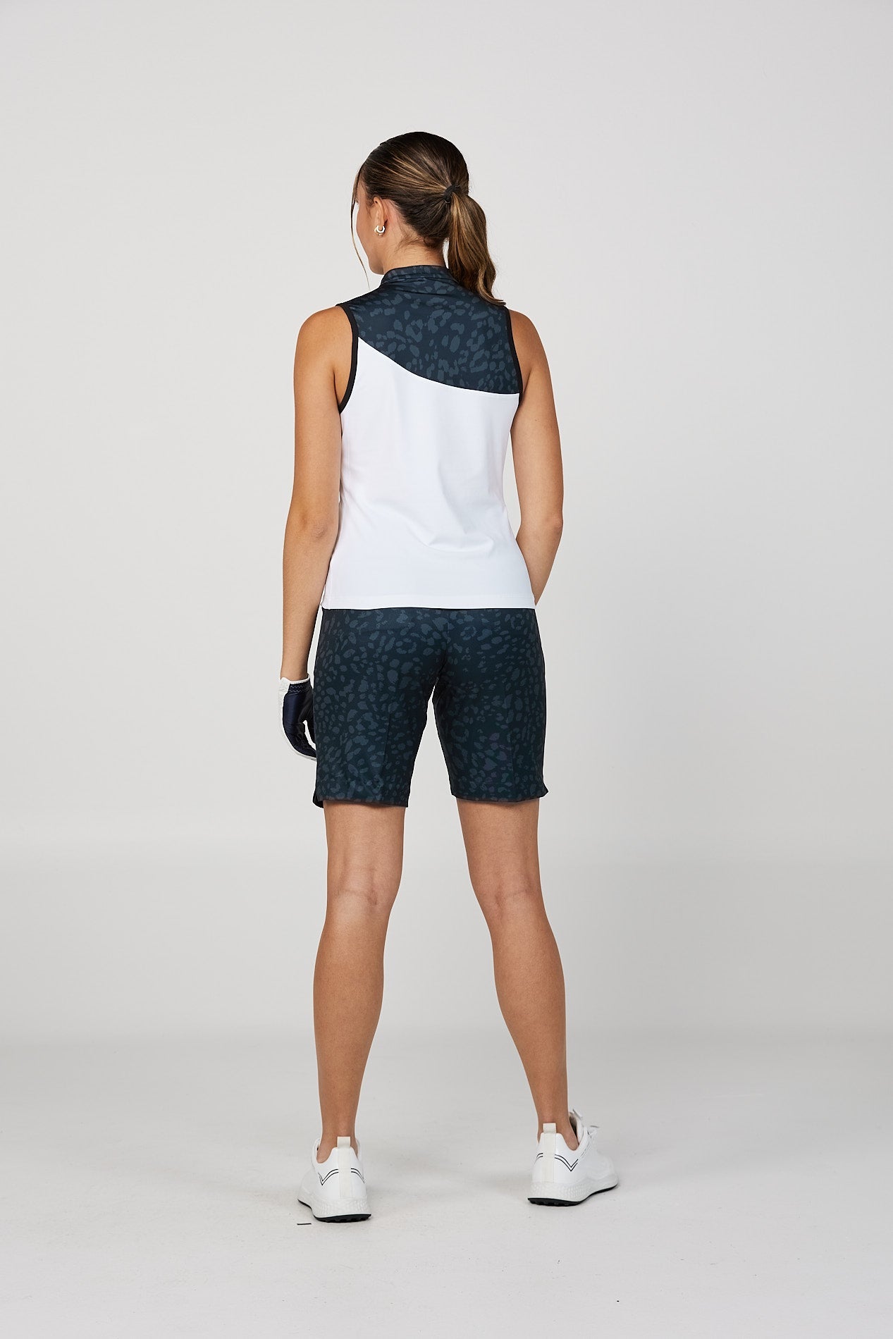 Isla Bonita Women's Golf Sleeveless Zipper Top by Sofibella, white and navy rear view
