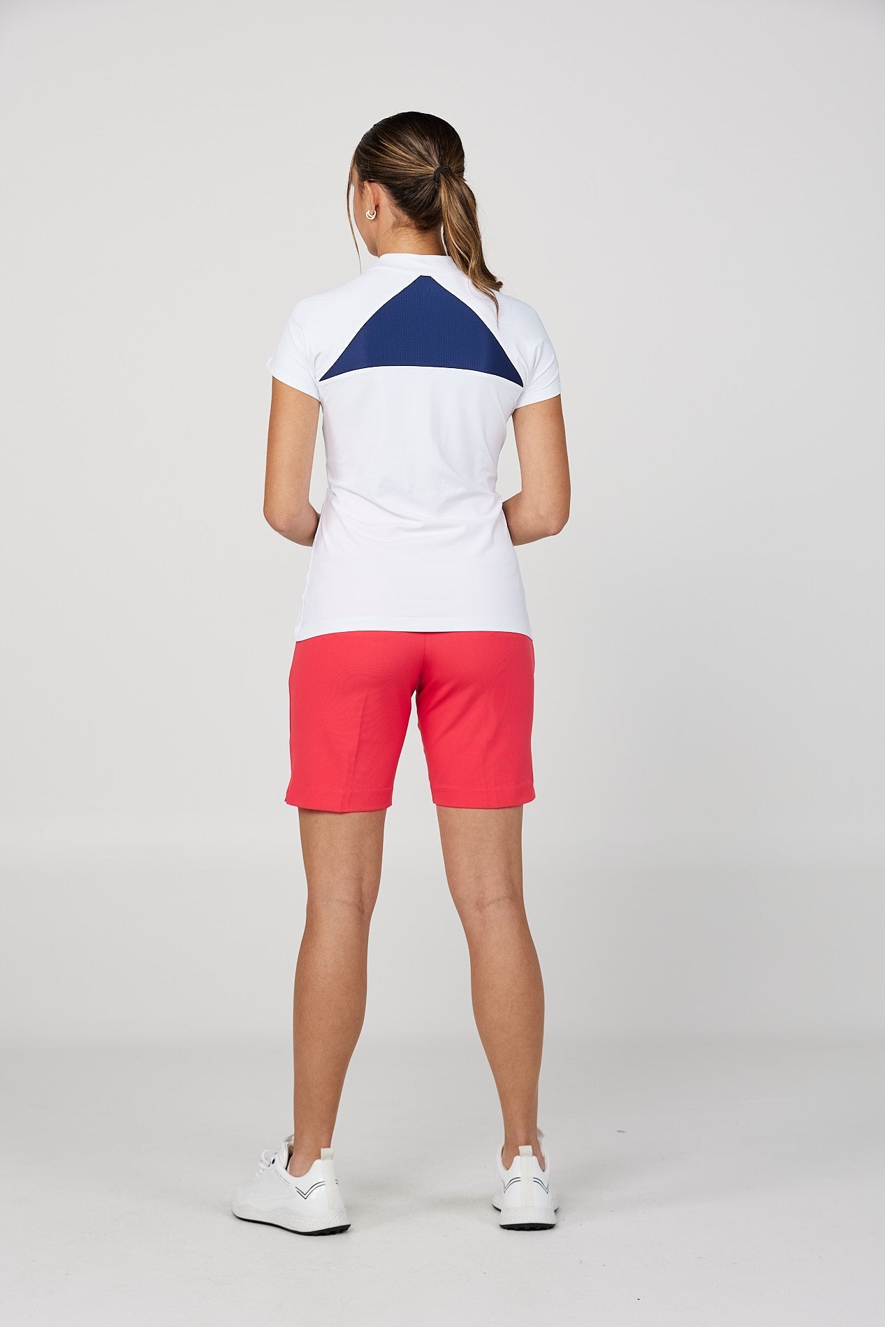 Women's White Raglan Golf Short Sleeve Zipper Top by Sofibella, view of back